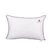 Soft white rectangular Sleepstore pillow with black piping, offering plush comfort and stylish design.