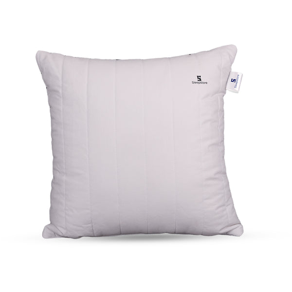 Square white Sleepstore cushion pillow with vertical stitched design on plain background.