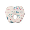 Baby pillow with cute sun, moon, and star print featuring a central head support hole.
