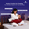Mother using Sleepstore feeding pillow for baby support, comfort, and posture.