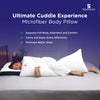 Woman sleeping with The Sleepstore microfiber body pillow – full-body comfort and alignment